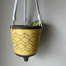 Load image into Gallery viewer, Yellow on Brown Hanging Planter with Macrame Hanger (Available for purchase at Clayworks CLT)
