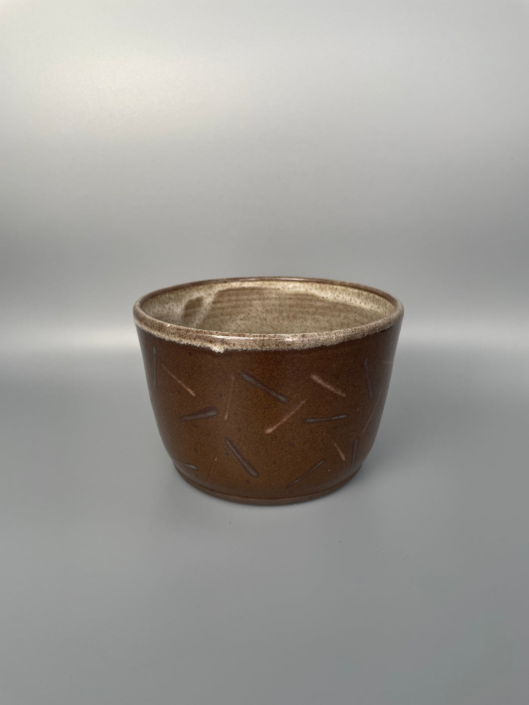 Brown Bowl with Dashes and Tan